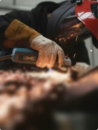 Welder working with sparks